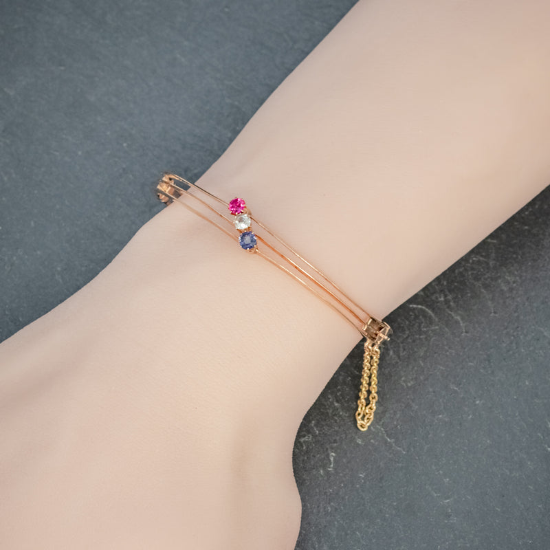 ANTIQUE EDWARDIAN DIAMOND SAPPHIRE RUBY BANGLE 15CT ROSE GOLD CIRCA 1910 hand