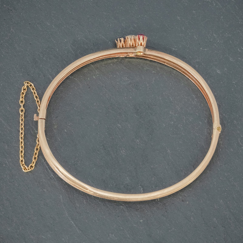 ANTIQUE EDWARDIAN DIAMOND SAPPHIRE RUBY BANGLE 15CT ROSE GOLD CIRCA 1910 top