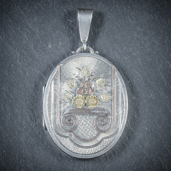 ANTIQUE VICTORIAN SILVER FLOWER LOCKET DATED BIRMINGHAM 1882 FRONT