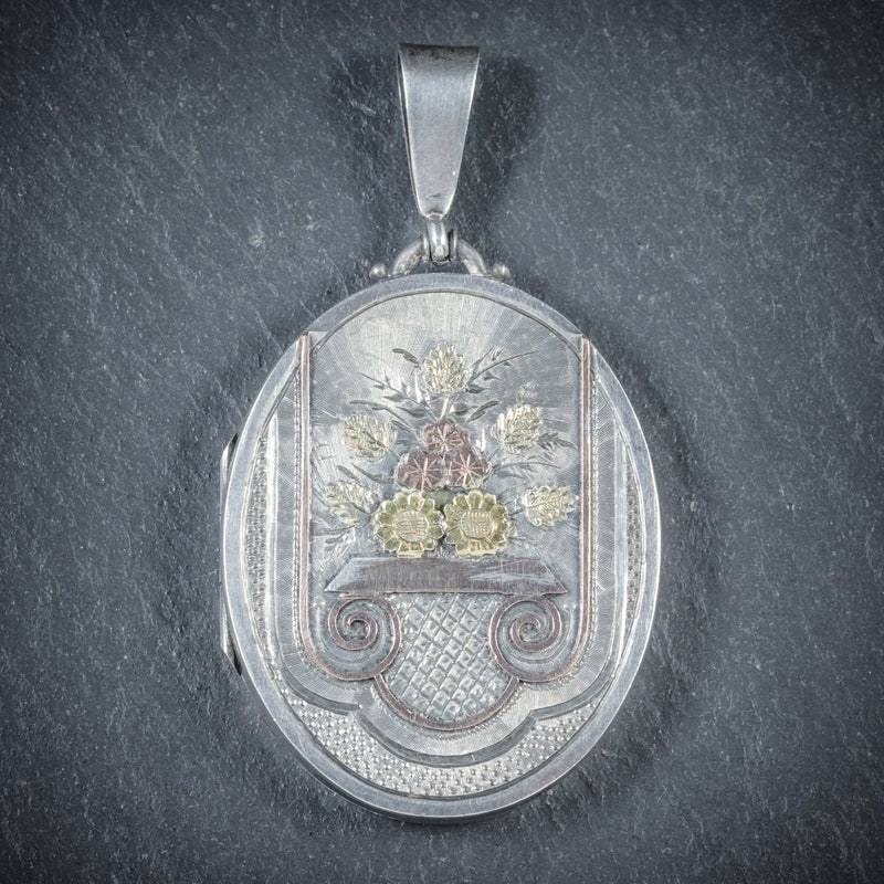 ANTIQUE VICTORIAN SILVER FLOWER LOCKET DATED BIRMINGHAM 1882 FRONT