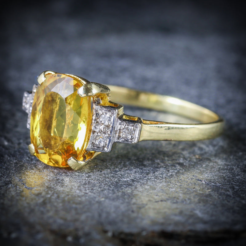 YELLOW BERYL AND DIAMOND TRILOGY RING 18CT GOLD ENGAGEMENT SIDE